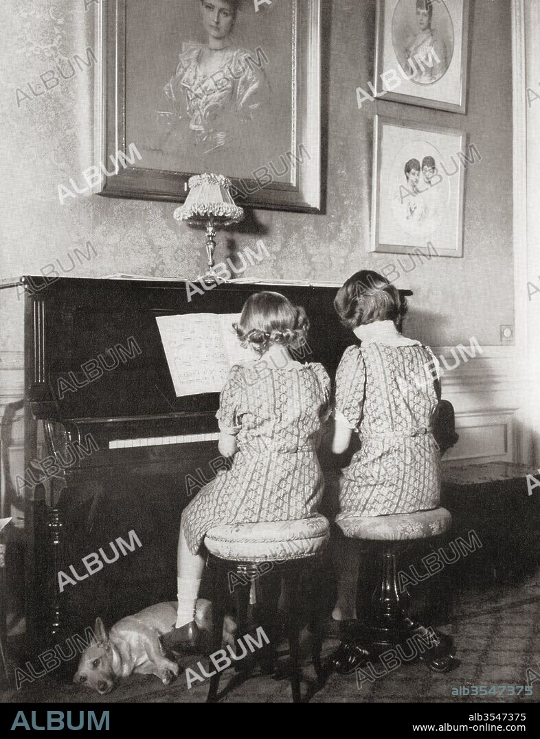 Princess Margaret, left, and Princess Elizabeth, future Queen Elizabeth II, right, playing a duet at the piano in 1940. Princess Margaret, Margaret Rose, 1930 – 2002, aka Princess Margaret Rose. Younger daughter of King George VI and Queen Elizabeth. Princess Elizabeth, future Elizabeth II, born 1926. Queen of the United Kingdom, Canada, Australia and New Zealand. From a photograph.