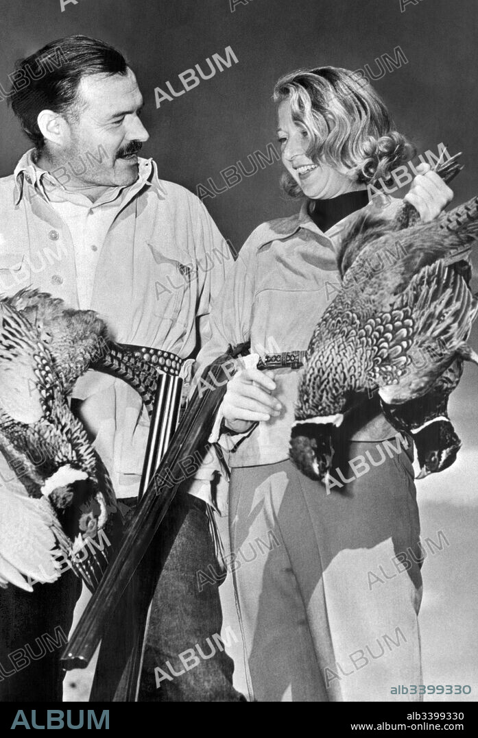 United States:  November 25, 1940  Author Ernest Hemingway with writer and journalist Martha Gellhorn after a day of pheasant hunting. They were married in December.