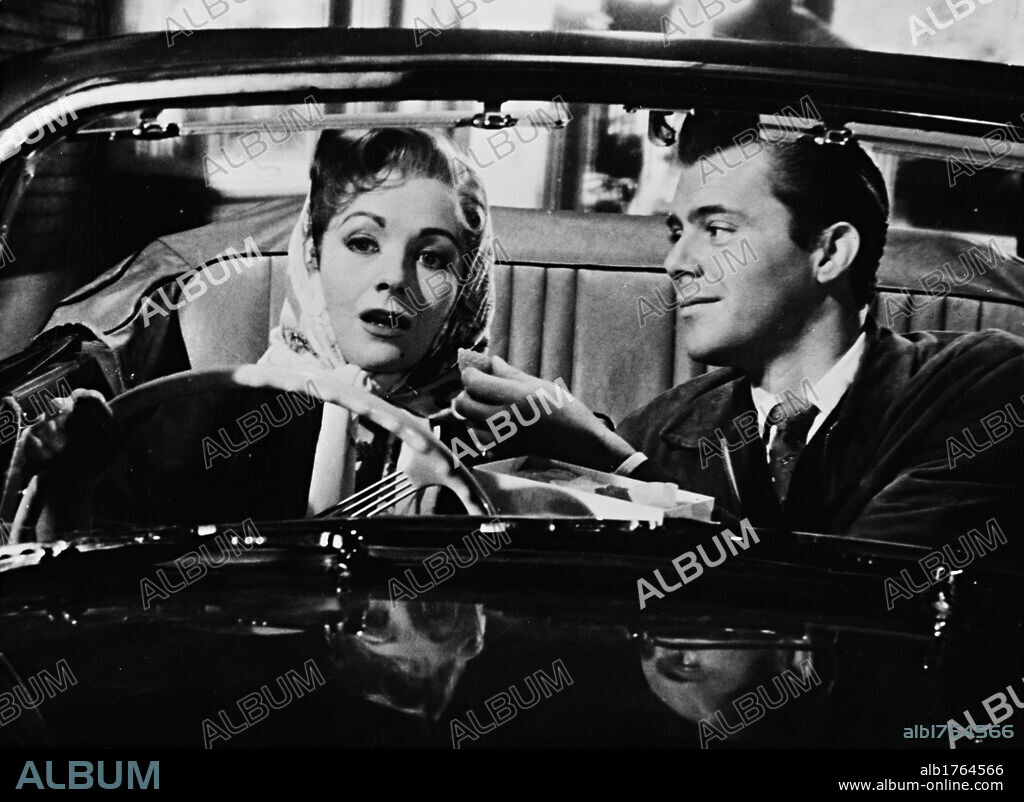 DIRK BOGARDE and MARGARET LOCKWOOD in CAST A DARK SHADOW, 1955, directed by LEWIS GILBERT. Copyright FROBISHER/EROS.