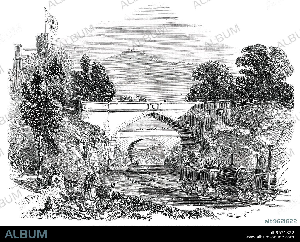 The Cork, Blackrock, and Passage Railway, Dundanion, [County Cork, Ireland], 1850. Steam locomotive on a narrow gauge railway in County Cork, Ireland, which opened in 1850. '...the carriages...were placed on the rails, and sent up and down the line until three o'clock, when a full freight of the directors and shareholders - as many as could be accommodated on both engine and tender - were taken down in 17 minutes and brought back in 10½, performing the run up and down quite to the satisfaction of all, and without the least possible oscillation or disagreeable motion...At Stop Island, the rail for the first time crosses the high road and mouth of the Douglas Channel, previous to entering the deep cutting at Blackrock, and shows the Douglas Channel. After passing through the cutting, the line again joins the water, and comes out at Dundanion...'. From "Illustrated London News", 1850.