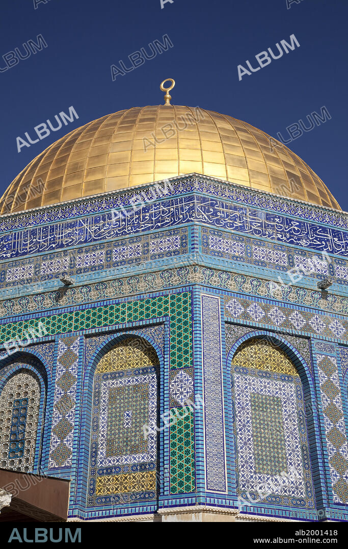 The Dome of the Rock is the oldest Islamic monument standing. It is a Muslim shrine that was built over a sacred stone, the "Foundation Stone". The stone is also the holiest site in Judaism, as well as a holy site in Islam. The edifice was built by Umayyad caliph Abd al-Malik from 688 to 691 AD. The exterior mosaic were repaired in the Mamluk period, and then completely replaced in 1545 by Sulieman the Magnificent. At the same time the parapet wall with its inscription was built. The tiling was replaced again in 1956-62. The aluminum dome is covered with gold leaf. The Old City of Jerusalem and its Walls were declared a World Heritage site by UNESCO in 1981.