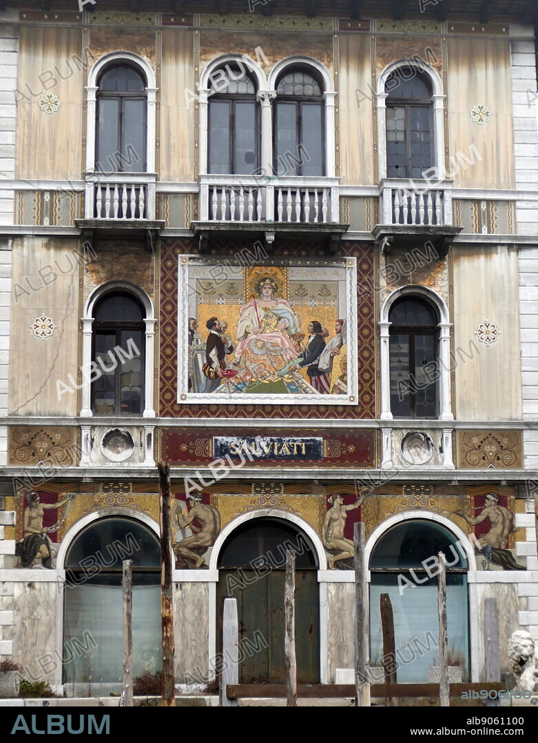 Palazzo Salviati on the Grand Canal in Venice, Italy. The building was built as a shop and the furnace of the Salviati family between 1903 and 1906, designed by the architect Giacomo Dell'Olivo. The company was founded in 1859 by Antonio Salviati. In 1924 the building underwent a major renovation, which involved the addition of an extra floor and the placement of a large mosaic façade.