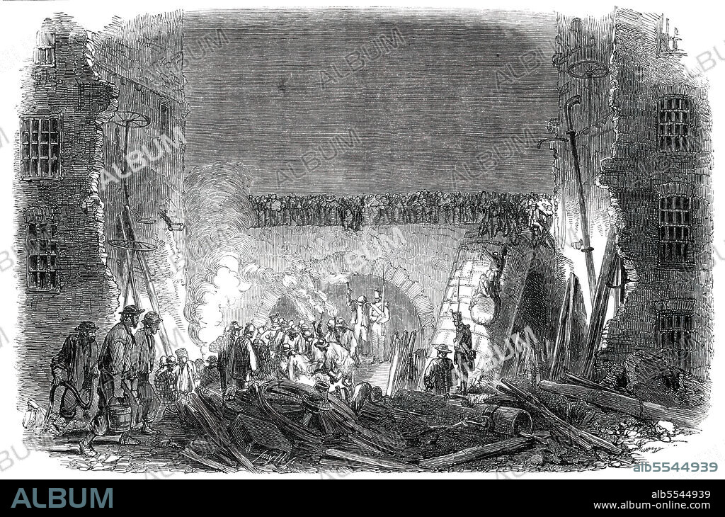SMYTH. Scene of the Late Boiler Explosion, Lily-Lane Mill, Halifax, [in Yorkshire], 1850. 'The boiler, with one huge lift, raised the whole of the four floors above it to a considerable height; when the entire mass of worsted-spinning frames and other machinery, along with the women and children who were unfortunately in the room at the time, were precipitated to the ground beneath, and buried in the mass of ruins...A little girl...and three others, were in one of the upper rooms, escaped in safety; having, as soon as they heard the shock, taken refuge in the privy, from which they were extricated by means of a ladder...several children, who had been playing in the boiler-house the previous morning, had been driven out...by Mr. Samuel Firth [the owner] - bidding them "go out of that place before the boiler burst"...the total number of persons whose lives have been sacrificed by this terrible accident amounts to ten'. From "Illustrated London News", 1850.