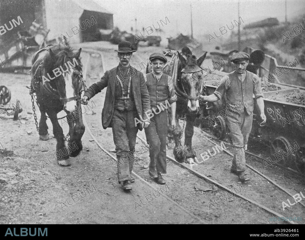 'After the settlement: Miners taking their ponies back to the pit', 1915. On 15 July 1915 about 200,000 coalminers in south Wales went on strike. They complained about poor wage rates and rejected an agreement that had been arrived at nationally. The strike was a serious event because the war effort depended on coal to fuel the navy and for the production of armaments. The miners were accused of treachery at a time of national crisis. From The Manchester Guardian History of the War Vol. III - 1915.. [John Heywood Ltd, London, 1915].