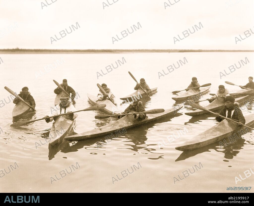 Eskimos in kayaks, Noatak, Alaska.