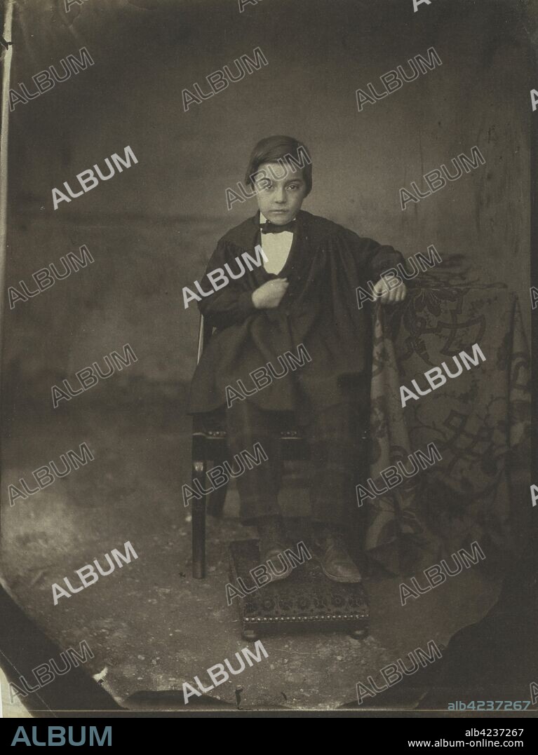 Portrait of a Young Boy, c. 1848. Louis-Adolphe Humbert de Molard (French, 1800-1874). Salted paper print from albumen on glass negative; image: 23.2 x 17.1 cm (9 1/8 x 6 3/4 in.); paper: 23.6 x 17.7 cm (9 5/16 x 6 15/16 in.); matted: 50.8 x 40.6 cm (20 x 16 in.).
