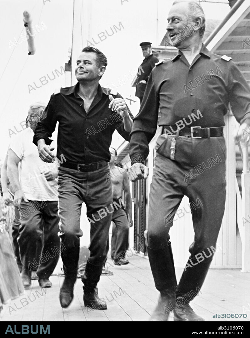 GLENN FORD and WHIT BISSELL in ADVANCE TO THE REAR, 1964, directed by GEORGE MARSHALL. Copyright M.G.M.