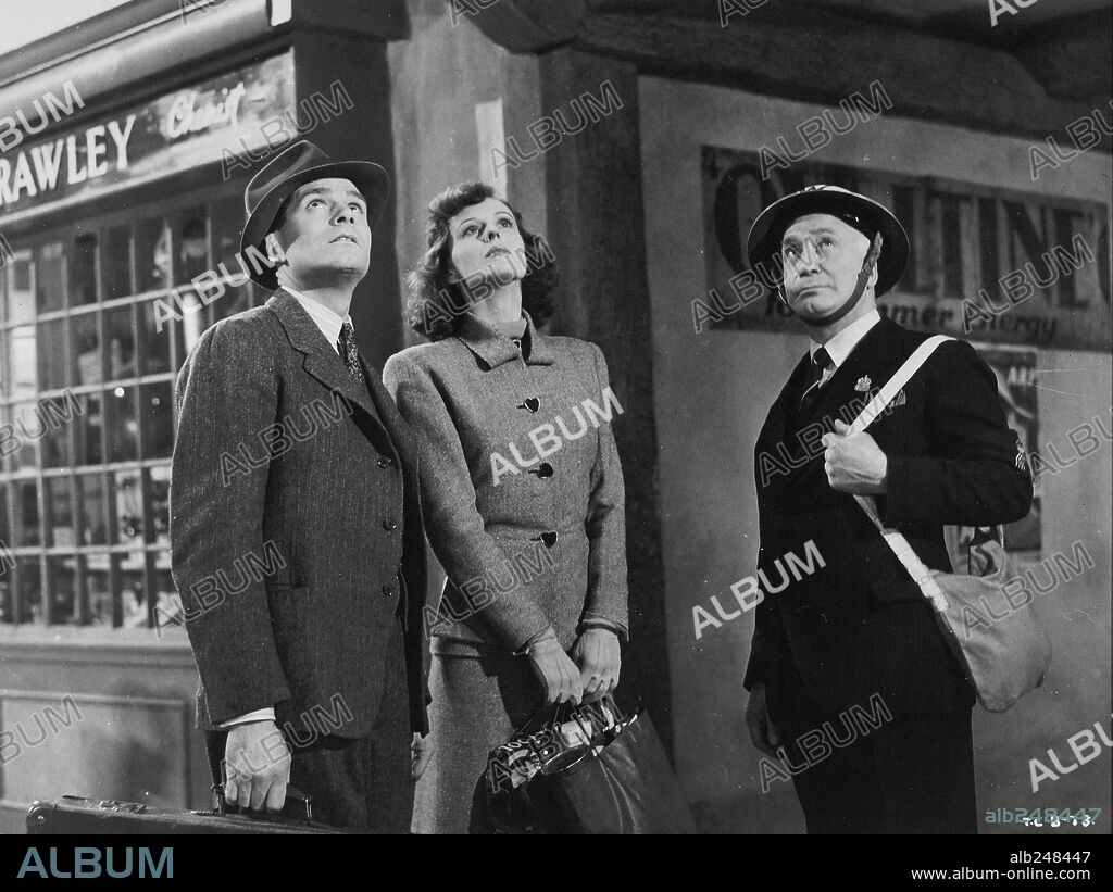 LAURENCE OLIVIER and PENELOPE WARD in THE DEMI-PARADISE, 1943, directed by ANTHONY ASQUITH. Copyright TWO CITIES/GENERAL FILM DISTRIBUTORS.