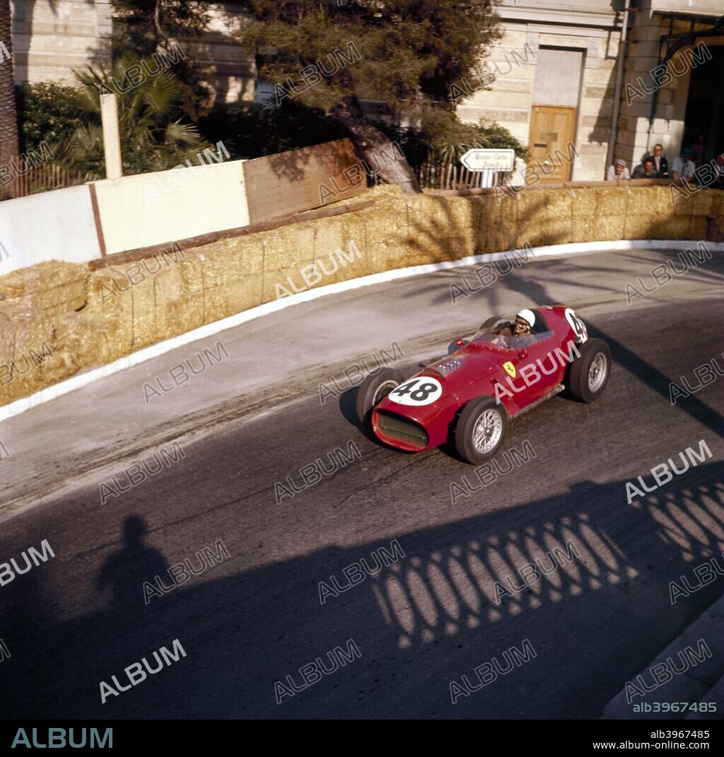 Phill Hill racing a Ferrari D246, Monaco Grand Prix, Monte Carlo, 1959. Photographed from a balcony, the shadow of which can be seen in the picture.  Hill finished fourth in this race.