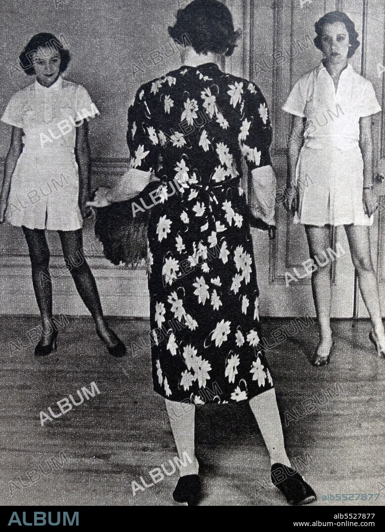 Josephine Bradley instructing debutantes in the intricacies of court curtsey, prior to their presentation, at her West End dancing school. Illustrated news cutting.
