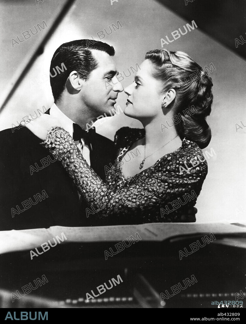 ALEXIS SMITH and CARY GRANT in NIGHT AND DAY, 1946, directed by MICHAEL CURTIZ. Copyright WARNER BROTHERS.