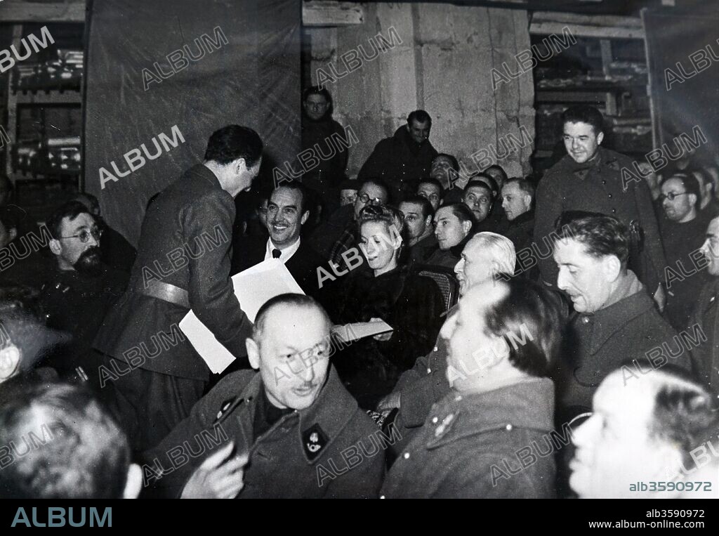 Photograph of a film screening in Paris, during the German occupation of France in World War Two. 1940. Danielle Darrieux and was present in the Army Cinema as the film 'Battements de Coeur ' (heartbeats), was shown. 1940 Danielle Yvonne Marie Antoinette Darrieux (born 1 May 1917) French actress and singer. Henri Decoin (1890 - 1969) was a French film director and screenwriter. Dated 20th Century.