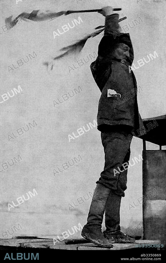 ANONYMOUS. Arseny Avraamov conducting from the roof the Symphony of Sirens.