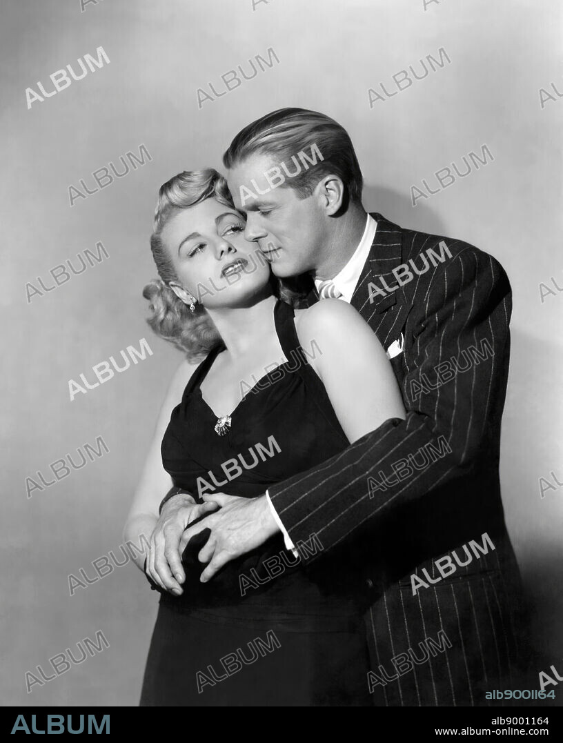DAN DURYEA and SHIRLEY SCHRIFT. DAN DURYEA and SHELLEY WINTERS in LARCENY, 1948, directed by GEORGE SHERMAN. Copyright UNIVERSAL INTERNATIONAL.