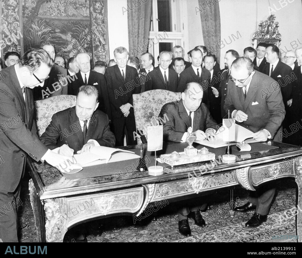 Czechoslovak Prime Minister Oldrich Cernik (Left) - One Of The Prague Spring Movement Leaders - And His Soviet Counter-Part Alexei Kosygin Singing The Agreement On October 16, 1968. (Photo by: Sovfoto/UIG via Getty Images).