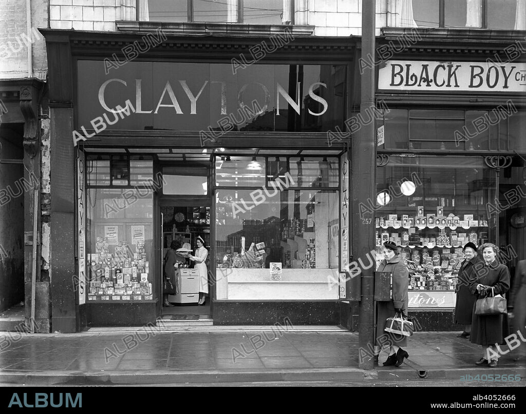 East Midlands Gas Board promotion, Mexborough, South Yorkshire, 1957. The exterior of Claytons in Mexborough, near Doncaster. The Gas Board and the National Coal Board (who produced gas from coal) were in competition with each other during the 1950s and 1960s and many of these types of promotions were run by both suppliers. This display was in Claytons in Mexborough, which is close to Doncaster.