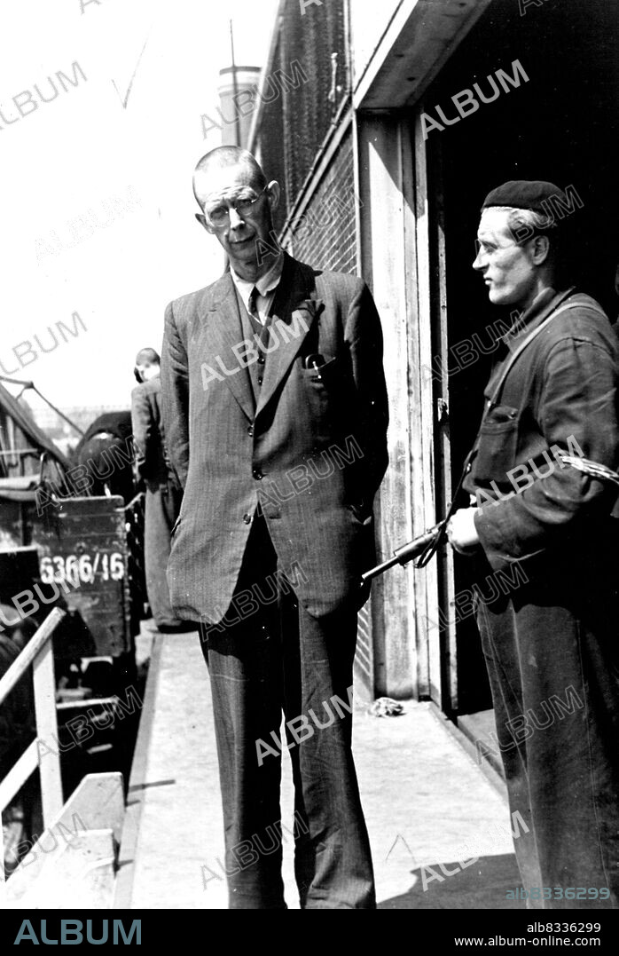 Dutch Collaborators And Traitors -- Professor Van Dam, former Secretary-General of the Ministry of education. This man was responsible for the nazification of Dutch schools and universities.In Amsterdam at the Levantkade, where in times before the war shiplosds of Dutch East Indian products were unloaded and stored, about 4,000 collaborators, traitors, etc are now under safeguard. They were caught by the Dutch underground resistance. There is room for 30,000. One of the prisoners if the former burgomaster of Amsterdum Voute. June 01, 1945. (Photo by J.de Jong, Anefo).