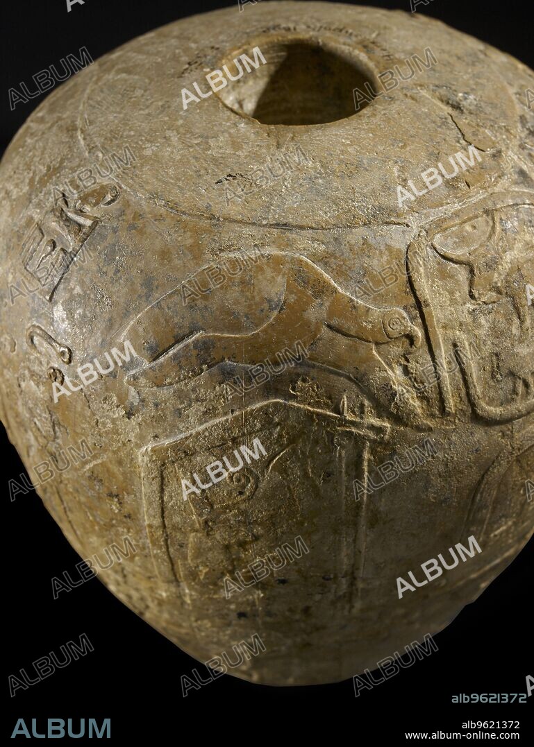 Macehead of Narmer, Protodynastic Period (Egypt), c3300 - c3200 BC. A vulture, possibly the local goddess Nekhbet, hovers with spread wings. Dimension: height: 19.8 cmdiameter: 18.7 cmweight: 10 kg.