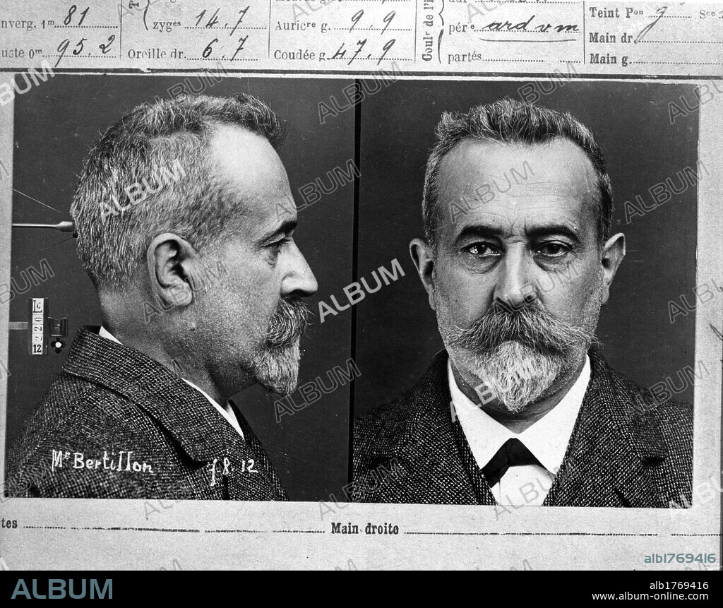 Selfportrait of Alphonse Bertillon posing for a test mugshot. Paris, 7th August 1912. Portrait of the French criminologist Alphonse Bertillon,  judicial anthropometry inventor, in a test mugshot . 7th August 1912.