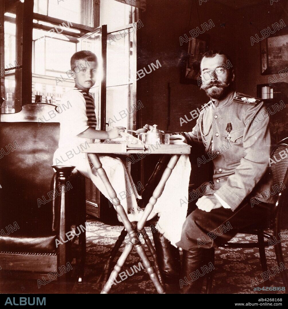 Tsar Nicholas II of Russia with his son, Alexei the Tsarevich. Alexei Nikolaevich (1904 – 17 July 1918)  the Tsarevich of the Russian Empire. He was the youngest child and only son of Emperor Nicholas II and Empress Alexandra Feodorovna. He was born with haemophilia, his mother's reliance on the faith healer Grigori Rasputin to treat the disease helped bring about the end of the Romanov dynasty.