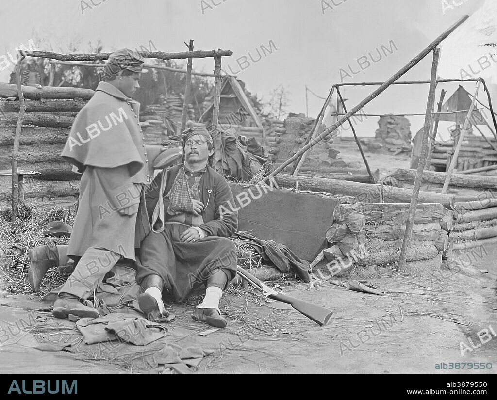 Scene showing a deserted camp and wounded Zouave soldier during the American Civil War, 1861 -1865. This photo has been digitally restored.