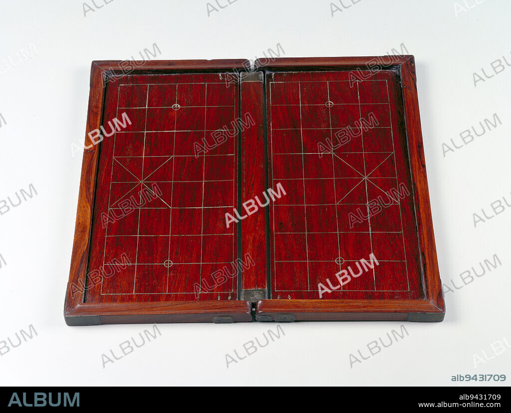Chess Board, late 17th-early 18th century, 5/8 x 16 1/4 x 16 3/8 in. (1.59 x 41.28 x 41.59 cm), Huang-hua-li hardwood and ivory, China, 17th-18th century, Although board games were used in China as early as the Shang dynasty (about 1600-1027 BCE), it is likely that 'Chinese' chess was invented in north India during the sixth century and spread to China and the West along trade routes.