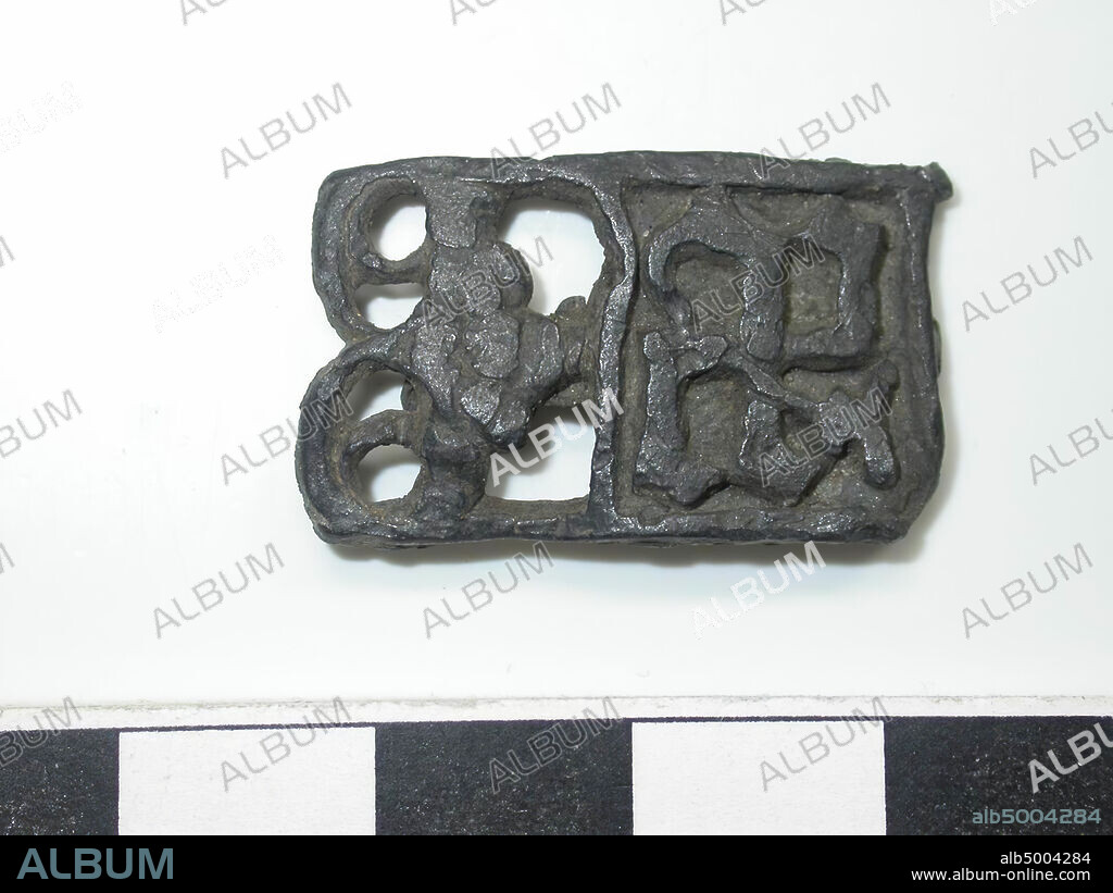 The Netherlands Middle Ages, belt fittings, metal, lead, tin alloy, H, 1.6 cm, W, 2.65 cm, D, 0.2 cm, late 14th century 1350-1400, the Netherlands, Zeeland, Hulst, Drowned Land.