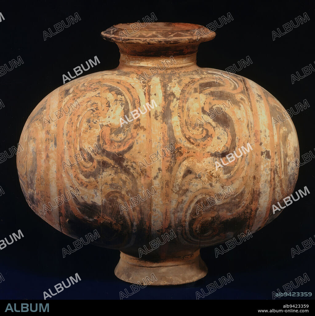 Cocoon-shaped Jar, 3rd-early 2nd century BCE, 12 1/8 x 13 1/4 x 8 1/2in. (30.8 x 33.7 x 21.6cm), Earthenware with traces of pigment, China, 3rd-2nd century BCE, Silk production, from the rearing of silkworms to weaving silk cloth, was an important source of income to Chinese farming families. This type of jar with its elegant cocoon shape was extremely popular during the Chin (221-206 b.c.) and Western Han periods (206 b.c.-a.d. 25). Plain grey earthenware was often painted during Han. The colors used were red, brown, green, yellow, black, white, orange, and blue. Jars like this may have been used in the ritual practices of sericulture as the rearing of silkworms was fraught with superstitions during the Han period.