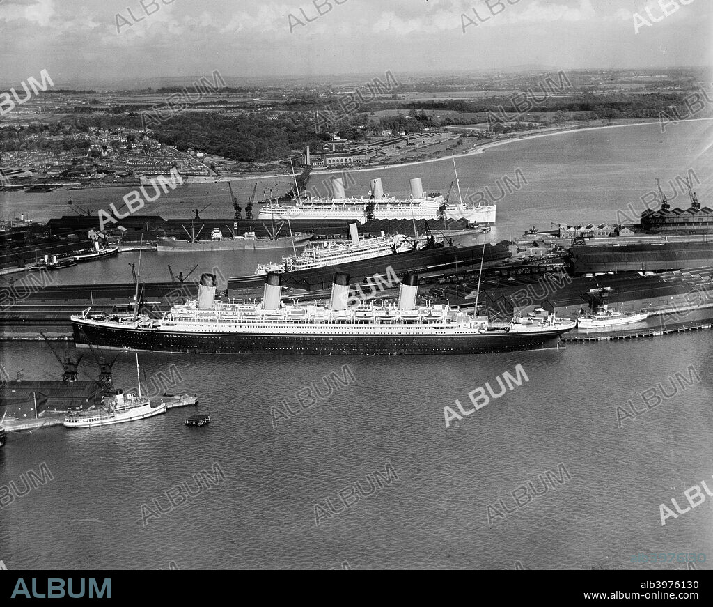 The RMS 'Olympic' in White Star dock 44, Southampton, Hampshire, 1933. A sister ship of the 'Titanic', 'Olympic' was built by Harland & Wolff in Belfast and entered service with the White Star Line in 1911. She was retired in 1935 and scrapped in 1937.
