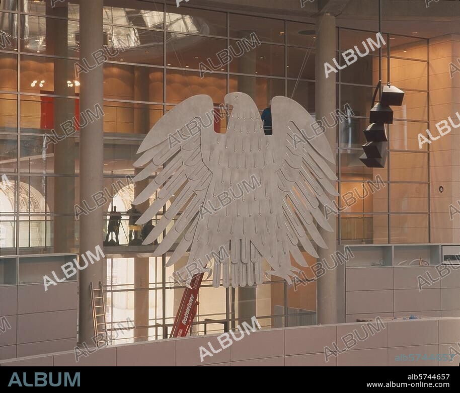 Berlin, Germany. Interior view of the Reichstag building: Plenary chamber with federal eagle. Photo, 1998.