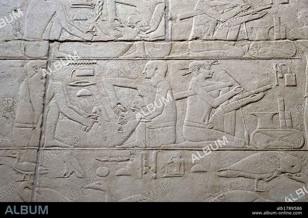 Egypt. Necropolis of Saqqara. Mastaba of Kagemni (2350 BC). Chief Justice and vizier of the Pharaoh Teti. Relief depicting the feeding of a cow and scribe. 6th Dynasty. Old Kingdom.