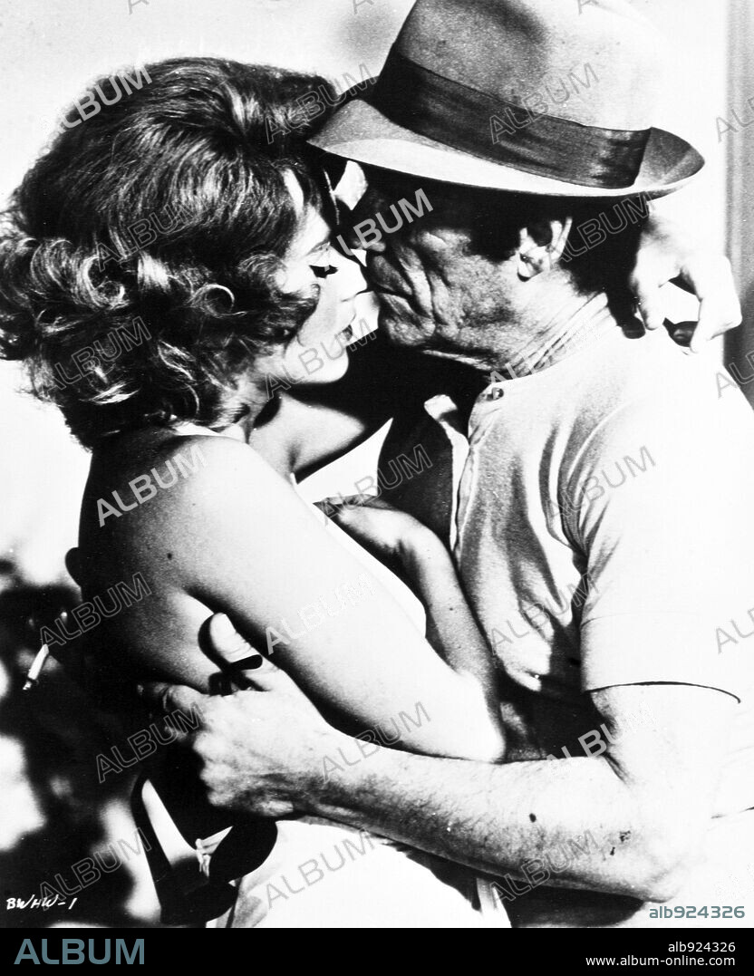 EDDIE CONSTANTINE and HANNA SCHYGULLA in BEWARE OF A HOLY WHORE, 1971 (WARNUNG VOR EINER HEILIGEN NUTTE), directed by RAINER WERNER FASSBINDER. Copyright CINEGATE LTD.