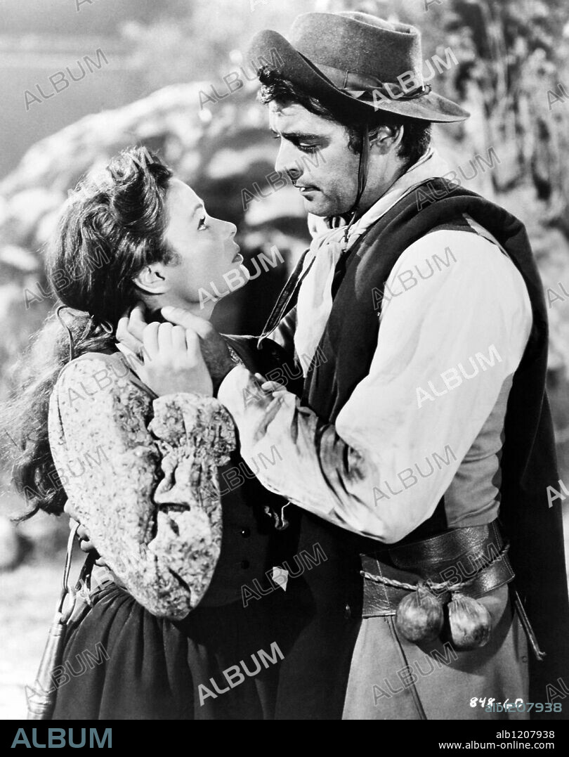 GENE TIERNEY and RORY CALHOUN in WAY OF A GAUCHO, 1952, directed by JACQUES TOURNEUR. Copyright 20TH CENTURY FOX.