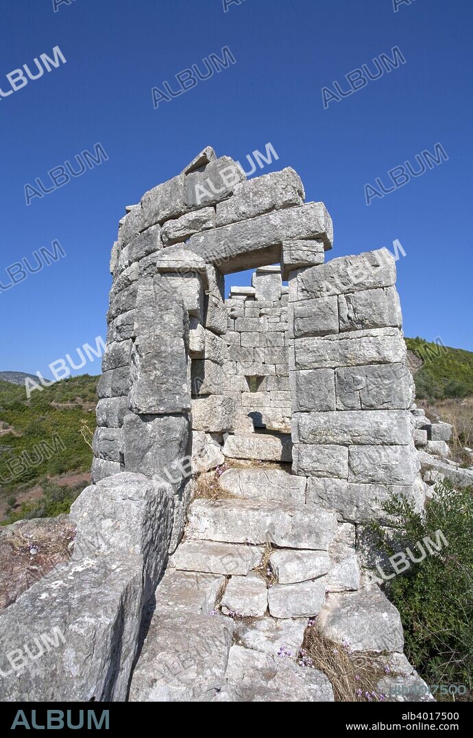 The walls of Messene, Greece. Ancient Messene lies on the slopes of Mt Ithomi, 30km/19 miles northwest of Kalamata. It was founded by Epaminondas in 369 BC after the battle of Leuctra and the first Theban invasion of the Peloponnese.