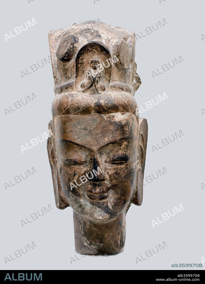 Head of a Bodhisattva, probably Avalokiteshvara (Guanyin). Culture: China. Dimensions: H. 21 5/16 in. (54.1 cm). Date: early 6th century.