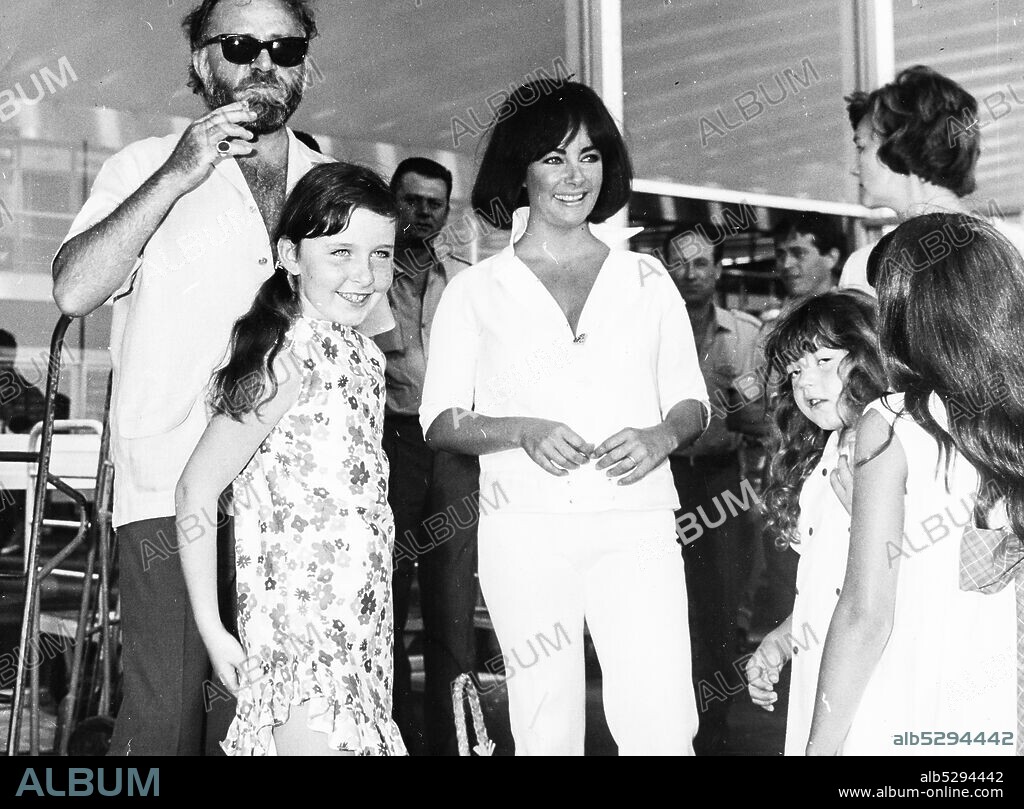 Elizabeth taylor. kay todd. richard burton. rome 1966. (Photo by: Marka/Universal Images Group via Getty Images).