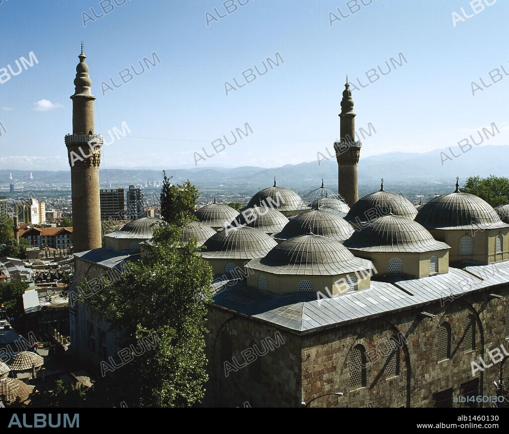 Turkey. Bursa. Ulu Cami (Grand Mosque ). Built in the Seljuk style, it was ordered by the Ottoman Sultan Bayezid I and built between 1396 and 1399. The mosque has 20 domes and 2 minarets. Exterior.