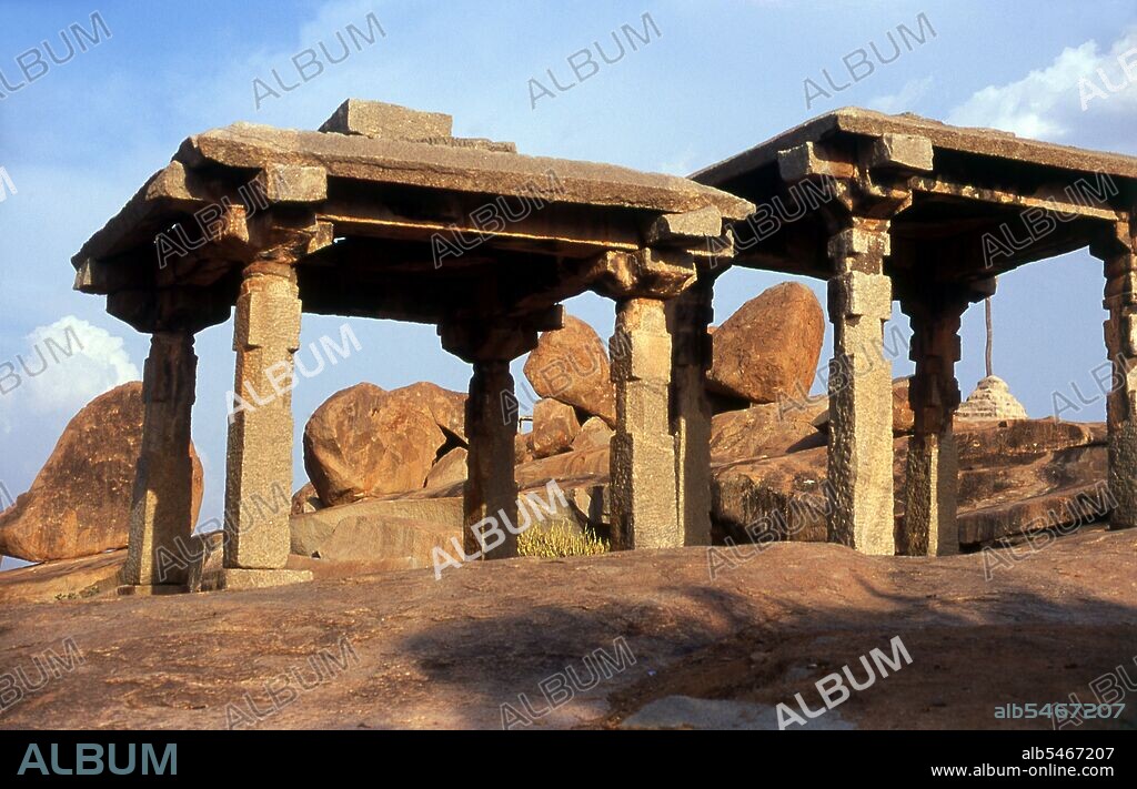 Hampi is a village in northern Karnataka state. It is located within the ruins of Vijayanagara, the former capital of the Vijayanagara Empire. Predating the city of Vijayanagara, it continues to be an important religious centre, housing the Virupaksha Temple, as well as several other monuments belonging to the old city. Jainism is an Indian religion that prescribes pacifism and a path of non-violence towards all living beings. Its philosophy and practice emphasize the necessity of self-effort to move the soul towards divine consciousness and liberation. Any soul that has conquered its own inner enemies and achieved the state of supreme being is called Jina (Conqueror or Victor). Jainism is also referred to as Shraman (self-reliant) Dharma or the religion of Nirgantha (who does not have attachments and aversions) by ancient texts. Jainism is commonly referred to as Jain Dharma in Hindi and Samanam in Tamil. Jain doctrine teaches that Jainism has always existed and will always exist, although historians date the foundation of organized or the present form of Jainism to sometime between the 9th and the 6th centuries BC. It has been hypothesized that like several traditions in Hinduism, proto-Jainism may have had its roots in the Indus valley civilization, reflecting native spirituality prior to the Indo-Aryan migration into India. In the modern world, it is a small but influential religious minority with as many as 4. 2 million followers in India,and successful growing immigrant communities in North America, Western Europe, the Far East, Australia and elsewhere.