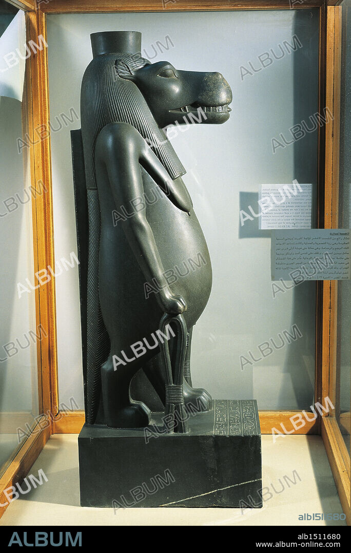 Egyptian civilization, Late Period, Dynasty XXVI. Schist statue of the goddess Tueris, from the chapel of Osiris Nebdjet at Karnak. H. 96 cm.