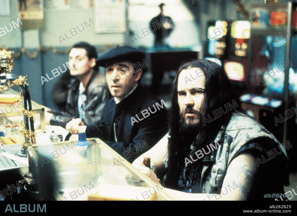 ALEX ANGULO and SANTIAGO SEGURA in THE DAY OF THE BEAST, 1995 (EL DIA DE LA BESTIA), directed by ALEX DE LA IGLESIA. Copyright SOGETEL.