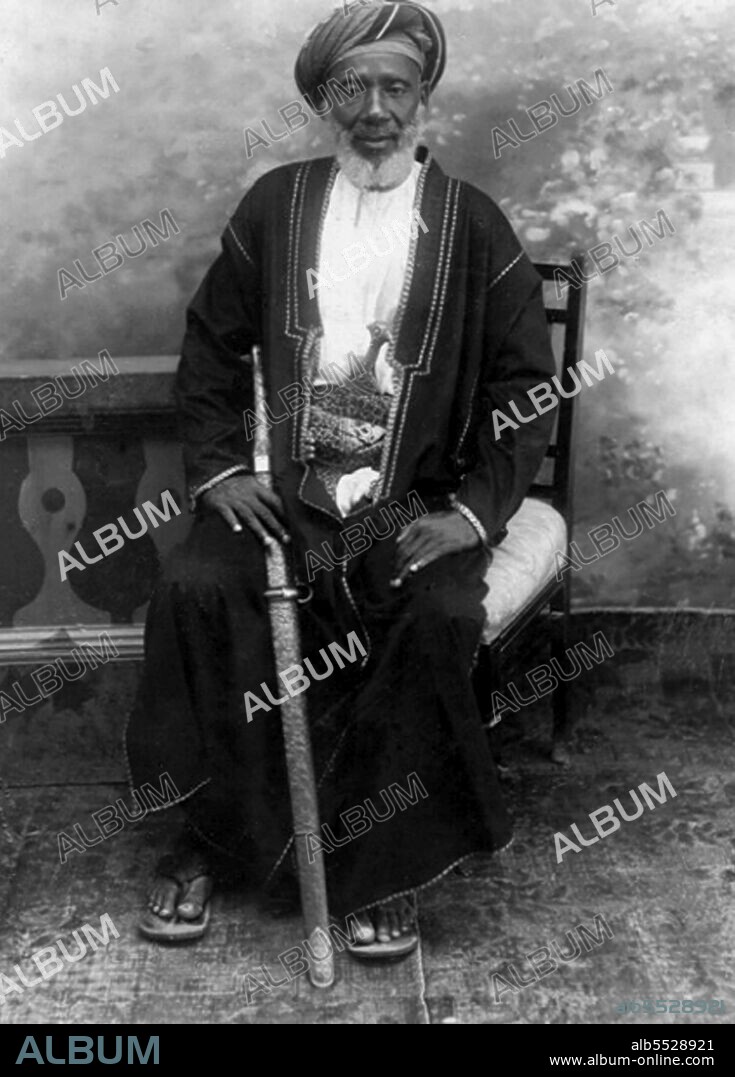 Tippu Tip or Tib (1837 – June 14, 1905), real name Hamad bin Mu?ammad bin Jumah bin Rajab bin Mu?ammad bin Sa‘id al-Murghabi, (Arabic: ??? ?? ???? ?? ???? ?? ??? ?? ???? ?? ???? ????????), was a Swahili-Zanzibari trader. He was famously known by the natives of East Africa as Tippu Tib after the sounds that his many guns made. A notorious slave trader, plantation owner and governor, who worked for a succession of sultans of Zanzibar, he led many trading expeditions into Central Africa, involving the slave trade and ivory trade. He constructed profitable trading posts that reached deep into Central Africa. He built himself a trading empire that he then translated into clove plantations on Zanzibar. Abdul Sheriff reported that when he left for his twelve years of empire building on the mainland, he had no plantations of his own. However, by 1895, he had acquired 'seven shambas [plantations] and 10,000 slaves'. His mother, Bint Habib bin Bushir, was a Muscat Arab of the ruling class. His father and paternal grandfather were coastal Swahili who had taken part in the earliest trading expeditions to the interior. He met and helped several famous western explorers of the African continent, including Henry Morton Stanley. Between 1884 and 1887, El Murgebi claimed the Eastern Congo for himself and for the Sultan of Zanzibar, Bargash bin Said el Busaidi. In spite of his position as protector of Zanzibar's interests in Congo, he managed to maintain good relations with the Europeans. Around 1890/91, he returned to Zanzibar where he retired. He wrote his autobiography, which is the first example of this literary genre in Swahili. El Murgebi wrote his autobiography in Swahili in Arabic script. Dr. Heinrich Brode, who knew him in Zanzibar, transcribed the manuscript into Roman script and translated it into German. It was subsequently translated into English and published in Britain in 1907. He died June 13, 1905, of malaria (according to Brode) in his home in Stone Town, the main town on the island of Zanzibar.