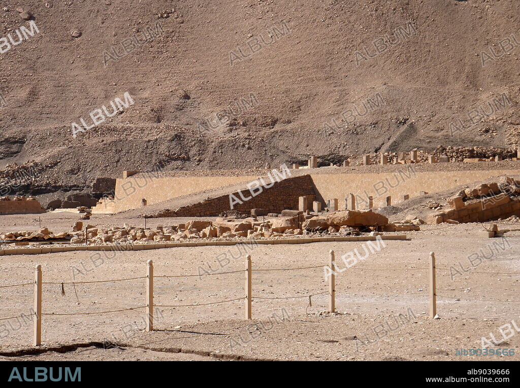 Mentuhotep II's temple at the Deir el-Bahari, mortuary temples and tombs, near Luxor, Egypt. It was constructed around 2000 BC, During the 11th dynasty. Nebhepetre Mentuhotep II (reigned c. 2061 BC 2010 BC) was a Pharaoh of the 11th Dynasty who reigned for 51 years. Mentuhotep II's most ambitious and innovative building project remains his large mortuary temple. The many architectural innovations of the temple mark a break with the Old Kingdom tradition of pyramid complexes and foreshadow the Temples of Millions of Years of the New Kingdom.