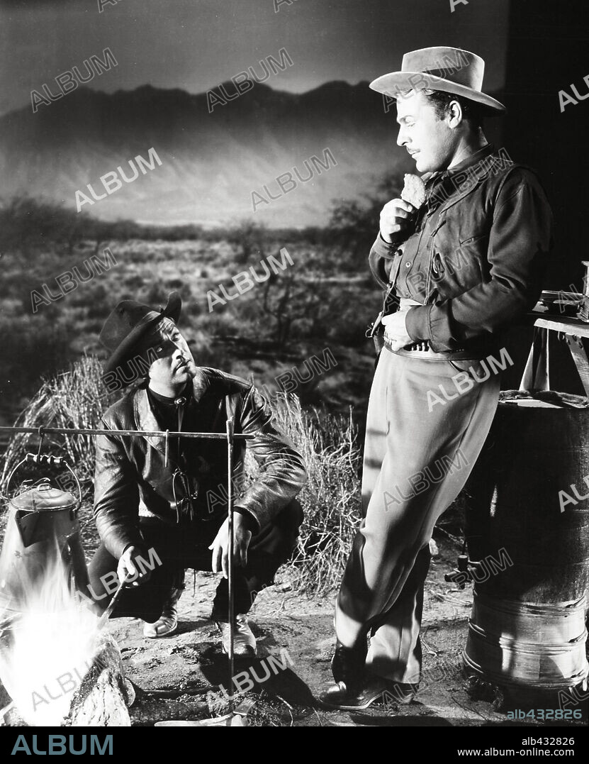 BRIAN DONLEVY y ROBERT TAYLOR en BILLY, EL NIÑO, 1941 (BILLY THE KID), dirigida por DAVID MILLER y FRANK BORZAGE. Copyright M.G.M.