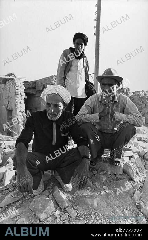 Iran-Iraq war (22.09.1980 - 20.08.1988) / war destruction. In the city of Dezful in Chuzestan province in southwestern Iran, 200 people were killed by Iraqi rocket bombing. The city was almost completely destroyed. Three older men in the rubble. Photo, 27.10.1980.
