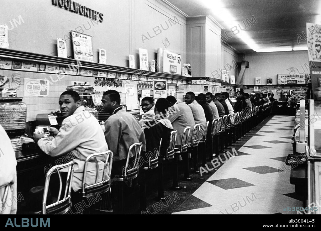February 9, 1960, Charlotte, NC. The very first sit-in took place a week earlier in Greensboro, NC. The Charlotte sit-in was not well covered at the time, but it marked the fact that what had happened in Greensboro was spreading to other Southern cities. It was the college students from Johnson C. Smith University who took part in the sit-ins. These students also started picketing a downtown theater to allow blacks to sit downstairs in the theater. The sit-ins had taken store management by surprise; the waitresses didn't know what to do and just faded away, leaving the students sitting at the counters. The students had told the chief of police what they were going to do in advance. The chief of police promised to make no arrests if they did it in an orderly way and he kept his word; no police ever appeared at the Charlotte sit-ins and there were no arrests. After a few hours, the students left and the stores put up signs saying their lunch counters were temporarily closed. On July 3rd, the counters at Woolworth's were reopened to everyone.