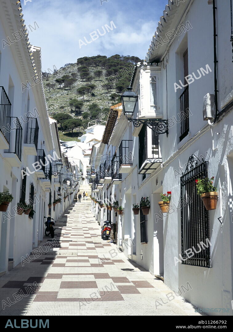 Calle San Sebastian, a narrow street in mountain village, Mijas, Malaga, Andalucia (Andalusia), Spain, Europe.