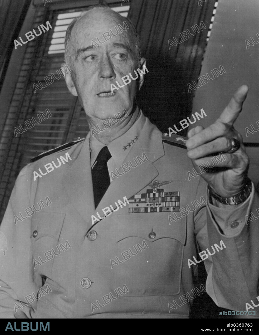 Tells Of U.S. Fliers' Orders to Shoot -- Adm. Felix Stump, Commander-in-chief of the Pacific fleet, at a Pentagon news conference this morning, says U.S. fliers are under orders to be "quick on the trigger" if a hostile pass is Made at them, "You don't have to wait and get your head blown off to shoot back." He discussed other details of the shooting down of two Chinese red planes by American fliers. July 26, 1954. (Photo by AP Wirephoto).