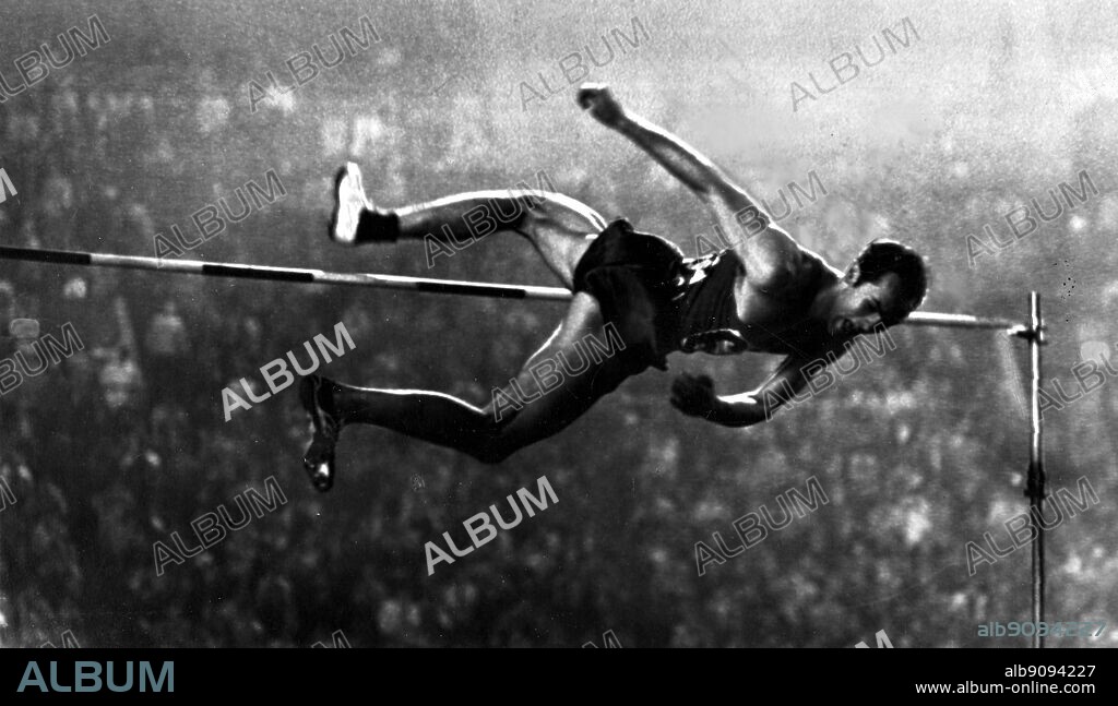 Japan, Tokyo Olympics, 1964: Valery Brumel (USSR) clears 7 feet, 1.75 (2.18m) inches to win the gold medal in the men's high jump.