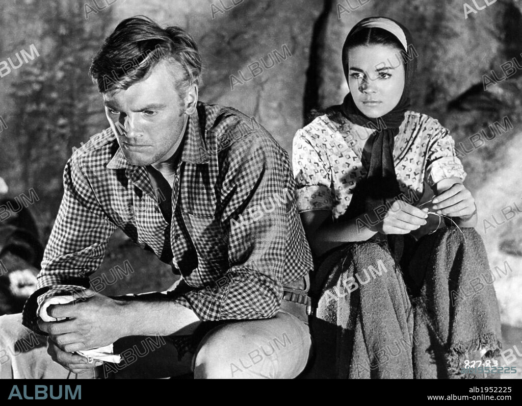 NATALIE WOOD and TAB HUNTER in THE BURNING HILLS, 1956. Copyright WARNER BROTHERS.