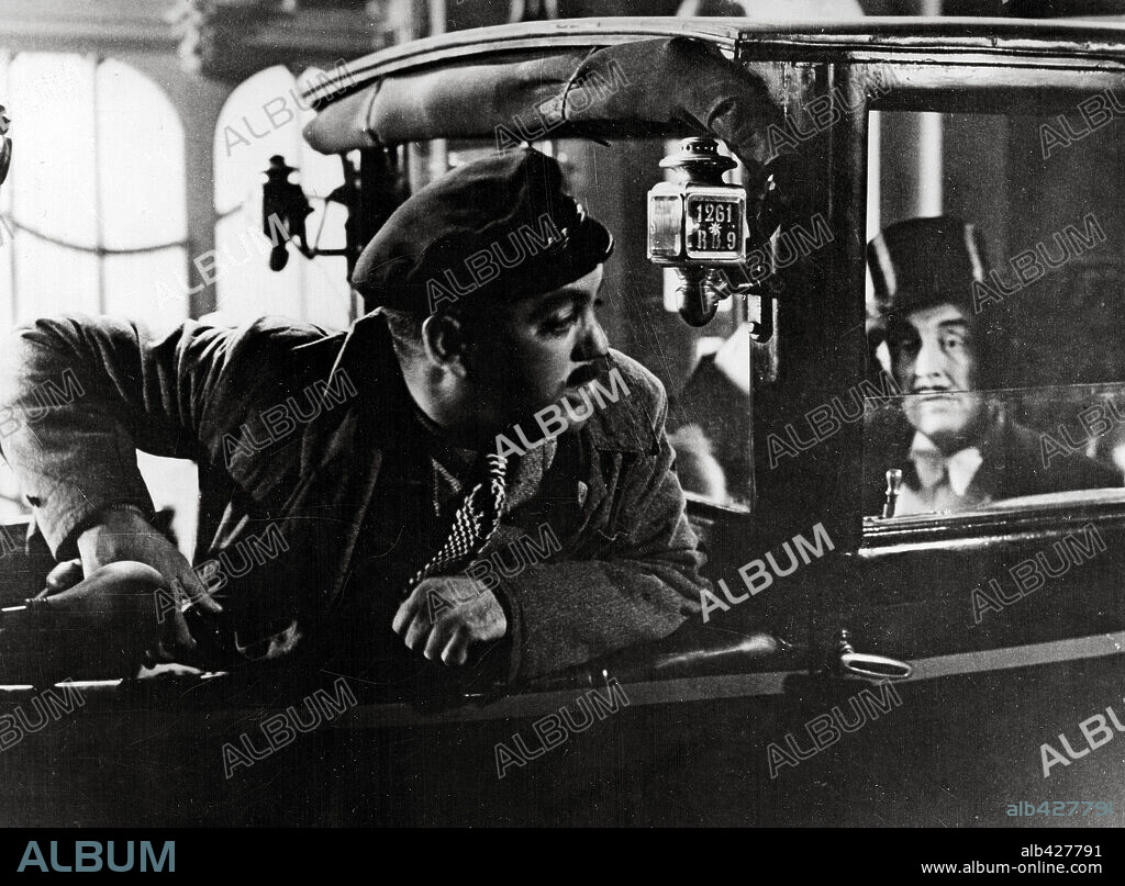 RAYMOND CORDY in JULY 14, 1933 (QUATORZE JUILLET), directed by RENE CLAIR. Copyright FILMS SONORES TOBIS.